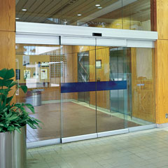Here is a picture of a modern day sliding door system on a office building Sliding Doors